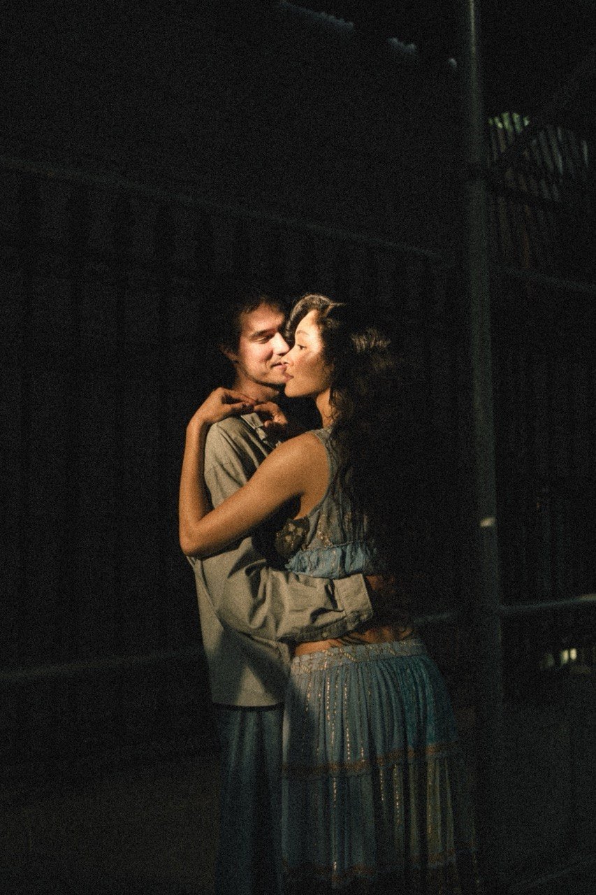 Couple dancing in moody light
